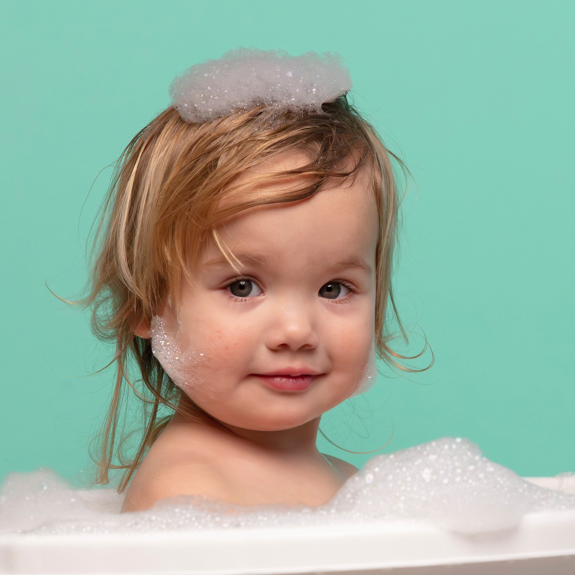 How do I wash and take care of my baby's hair?